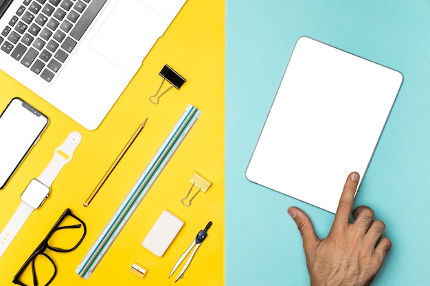 Flat lay desktop concept with mockup tablet Free Photo