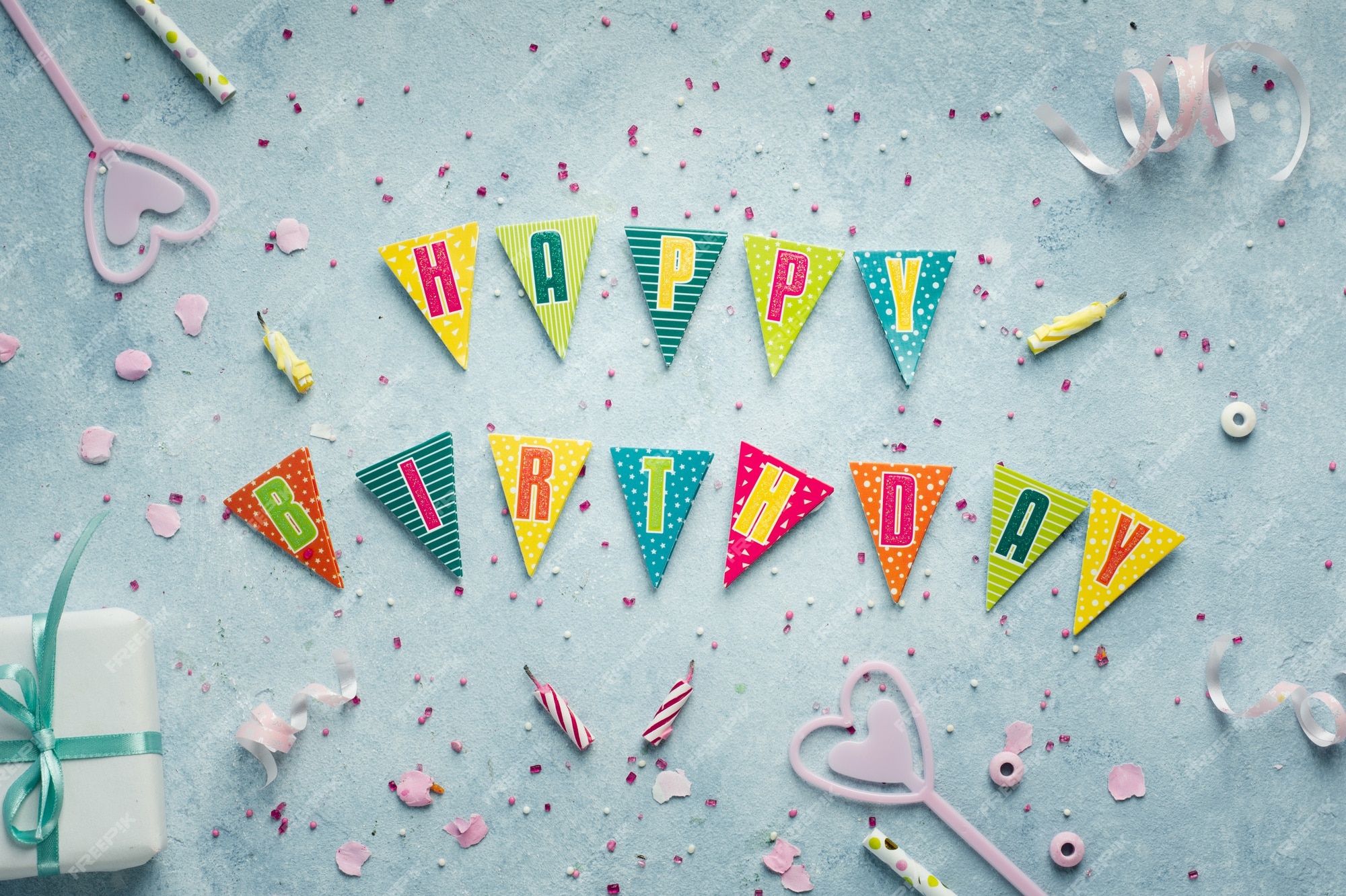 Free Photo | Flat lay of happy birthday wish in garland with present