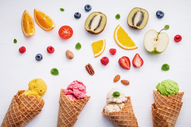 Flat lay ice cream cones collection on white background for sweets menu design. Premium Photo