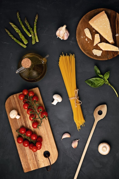 Premium Photo | Flat lay of ingredients for cooking italian pasta ...