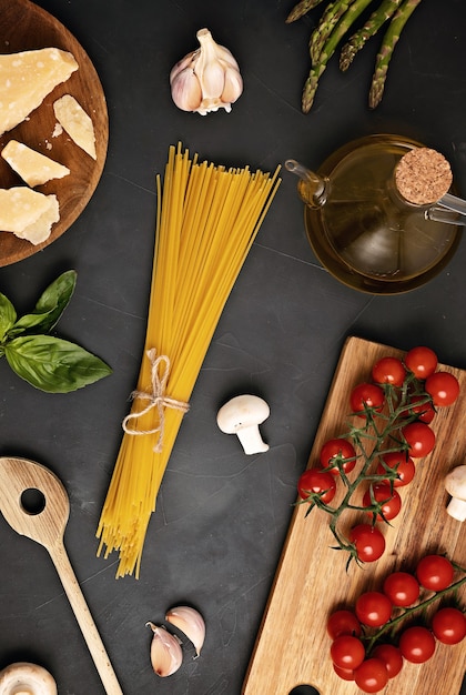 Premium Photo | Flat lay of ingredients for cooking italian pasta ...