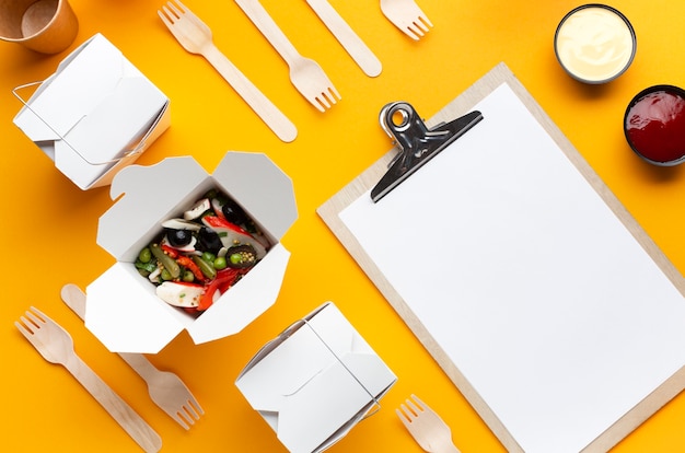 Download Flat lay salad box with clipboard mock-up Photo | Free ...