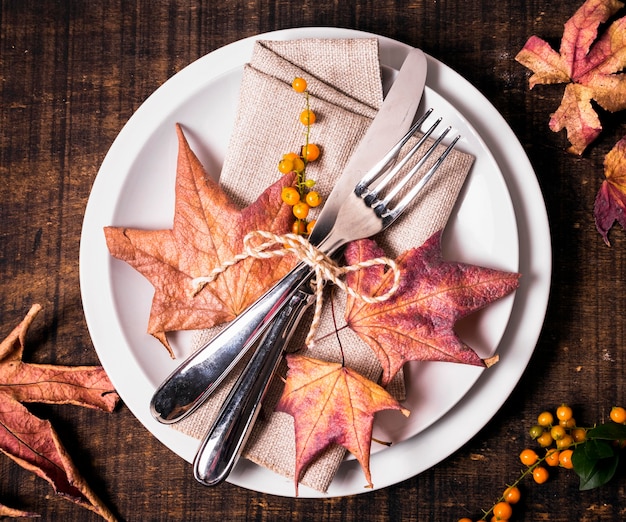 Free Photo | Flat lay of thanksgiving dinner table arrangement with cutlery