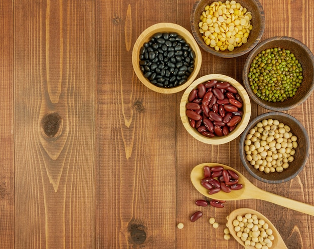 Flat lay top view assorted beans including red bean soybeans black beans mung beans Premium Photo