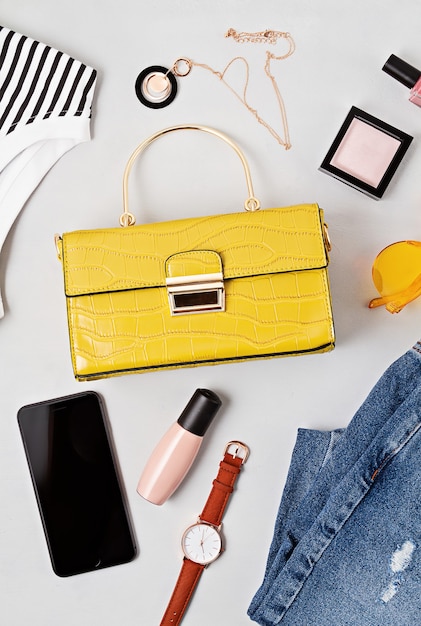 Premium Photo | Flat lay with woman fashion accessories in yellow ...