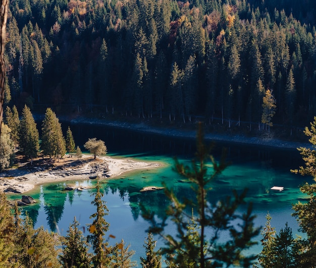 Premium Photo | Flims lake at switzerland, alpine mountains, sunny ...