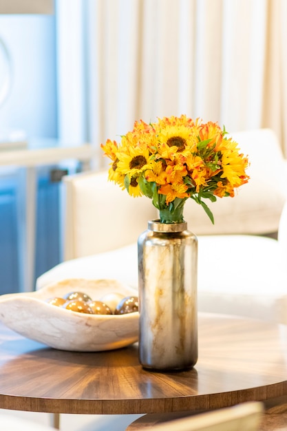 Floral Arrangement Of Sunflowers Decorating The Living Room Of The