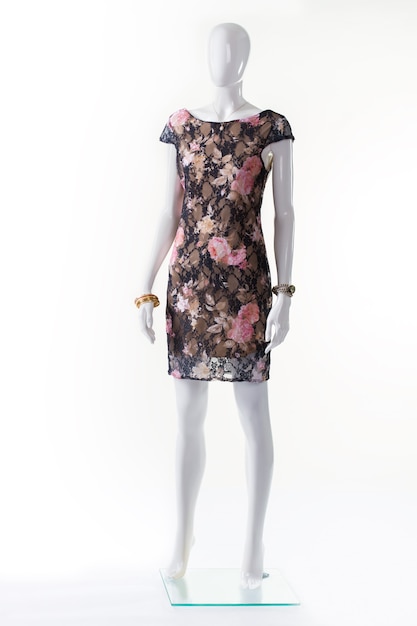 Premium Photo | Floral evening dress on mannequin. female mannequin in ...