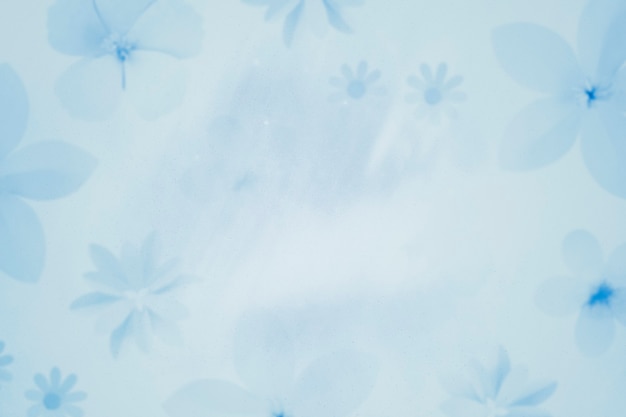Premium Photo | Flower patterned light blue background