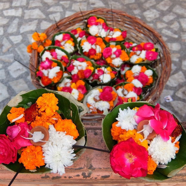 Premium Photo | Flowers for ganga aarti ceremony in parmarth niketan ...