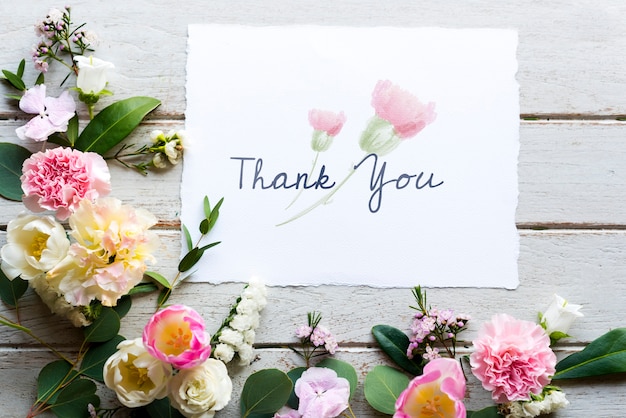 Premium Photo | Flowers withthank you wishing card