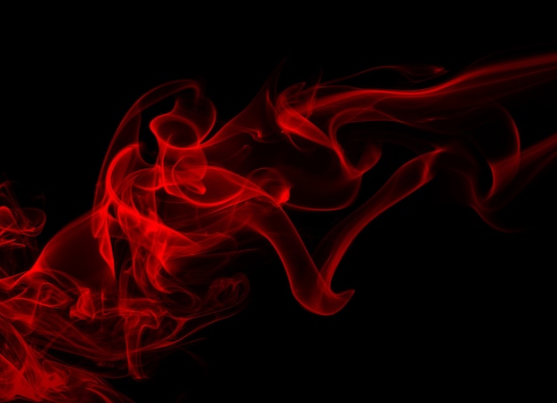 Premium Photo | Fluffy puffs of red smoke and fog on black background ...