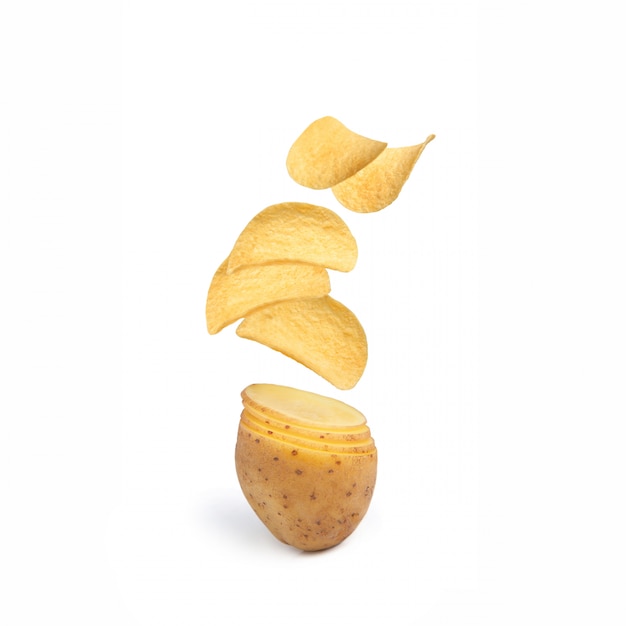 Premium Photo | Flying chips. potatoes turn into chips. creative ...