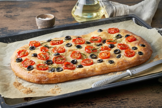 Premium Photo | Focaccia with tomatoes and olives