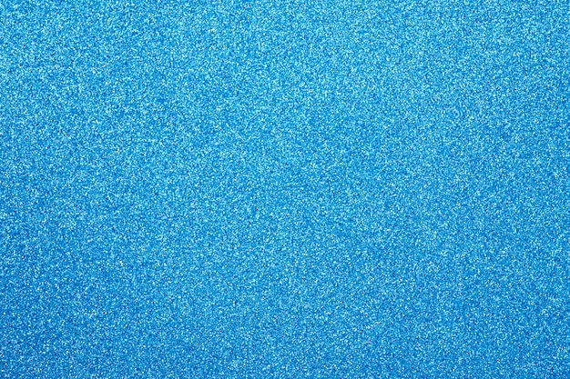 青の抽象的なキラキラ背景に焦点を当ててください プレミアム写真