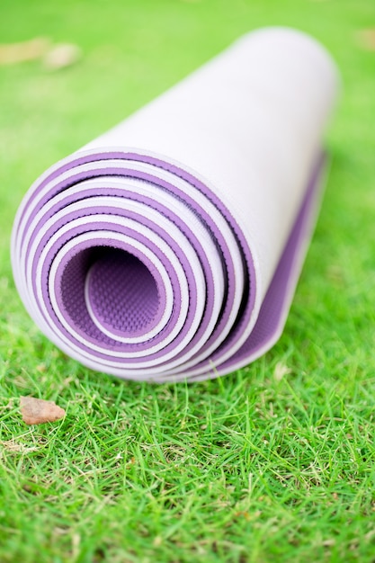 Folded Exercise Fitness Or Yoga Mat On Grass Photo Free Download