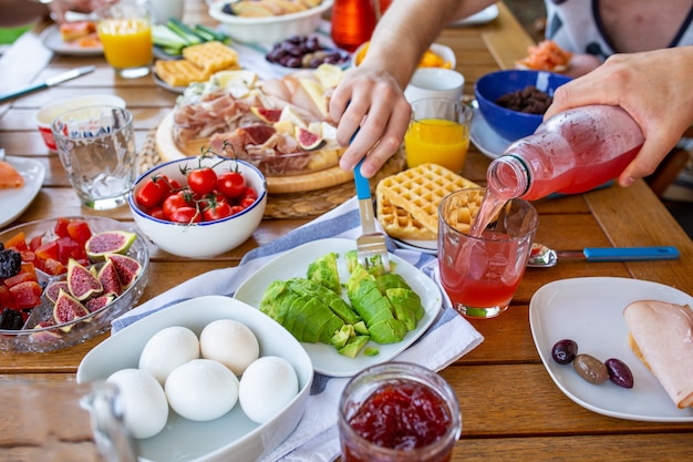 Premium Photo | Food on the tablelaid table with foodbreakfast on the ...