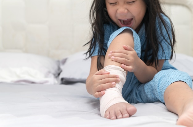 Foot Pain Little Kid With Broken Leg On Bed Kid After Accident