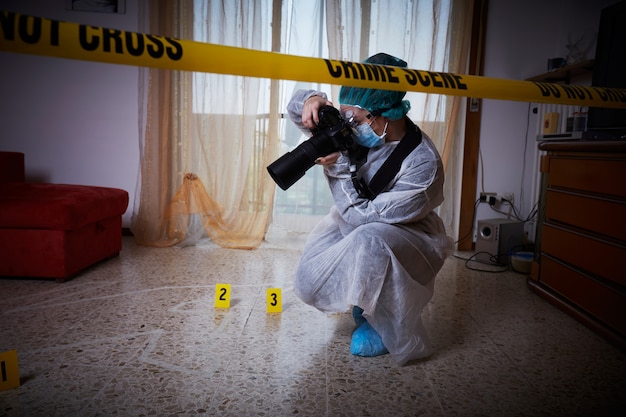 Forensic doctor working on a crime scene Photo | Premium Download