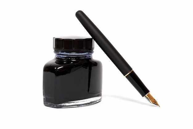 Premium Photo | Fountain pen with ink bottle