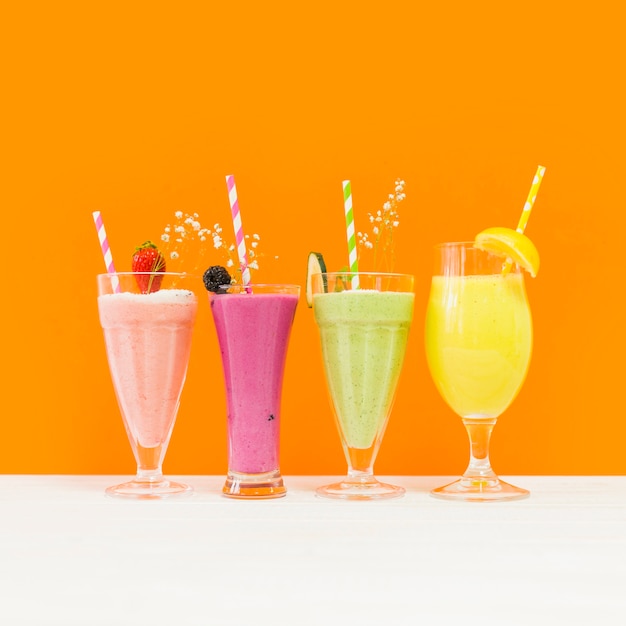 Four delicious summer smoothies Free Photo