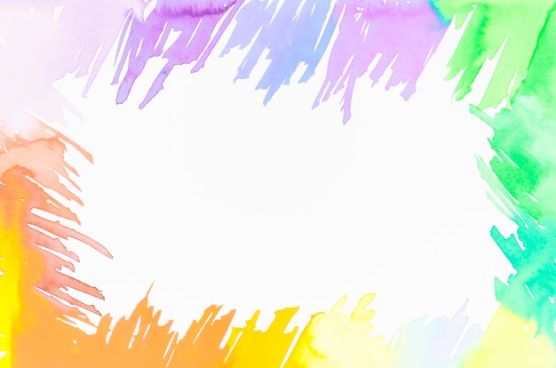 Frame made with colorful brush strokes design with space for writing the text on white backdrop Free Photo