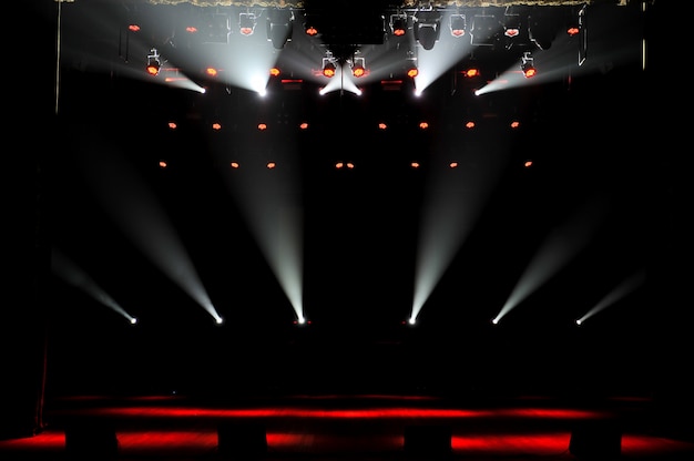 Free stage with lights, lighting devices. background. Photo | Premium ...