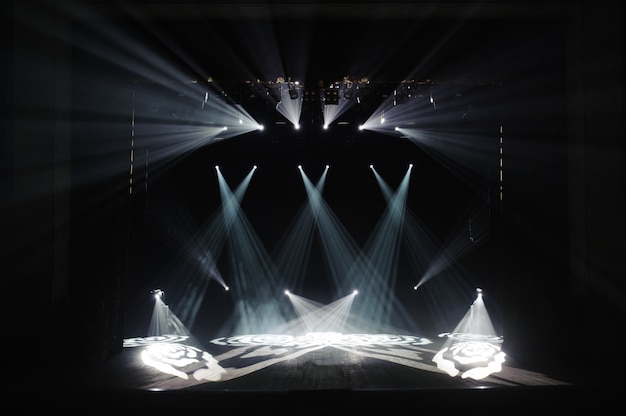 Premium Photo | Free stage with lights, lighting devices. background.