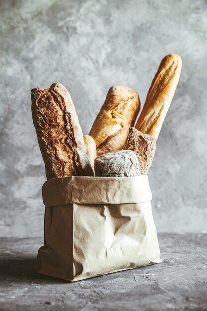 Premium Photo | French pastries, baguettes on a gray background in a ...