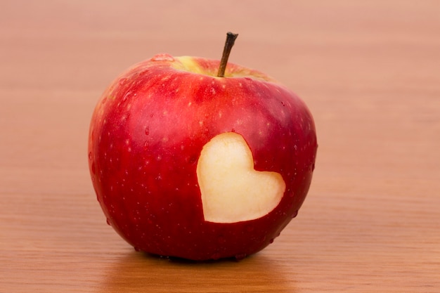 Premium Photo | Fresh apple with heart, a valentines day theme