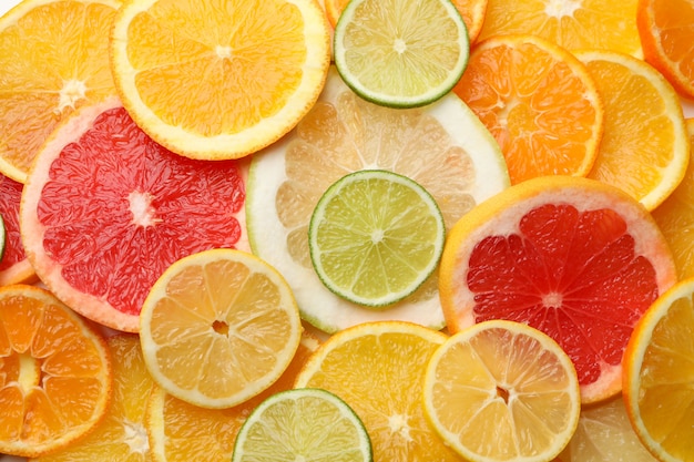 Fresh citrus fruits slices texture background, close up | Premium Photo