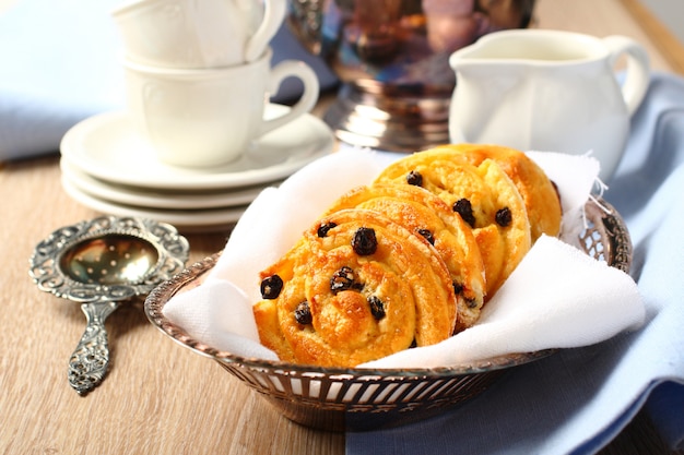Premium Photo | Fresh gluten free sweet swirl buns with raisins for ...
