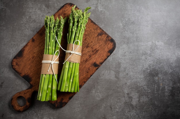 Fresh green asparagus on table. Free Photo