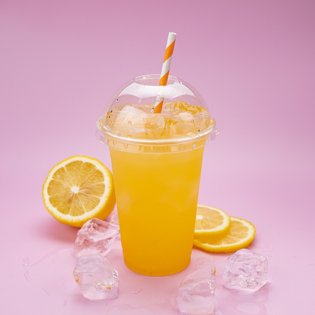 premium-photo-fresh-lemonade-with-oranges-in-a-plastic-cup