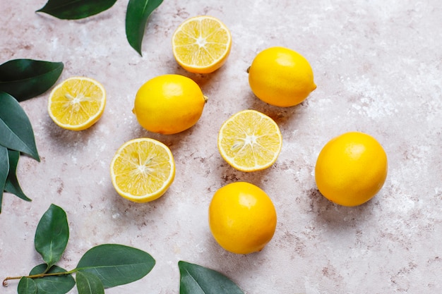 Fresh lemons on light surface,top view Free Photo