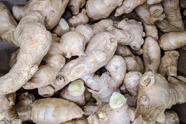 Premium Photo | Fresh organic ginger on fresh market, background ...