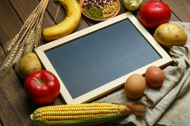 Free Photo Fresh Organic Vegetables Fruits Eggs Beans And Corns With Blackboard On Vintage