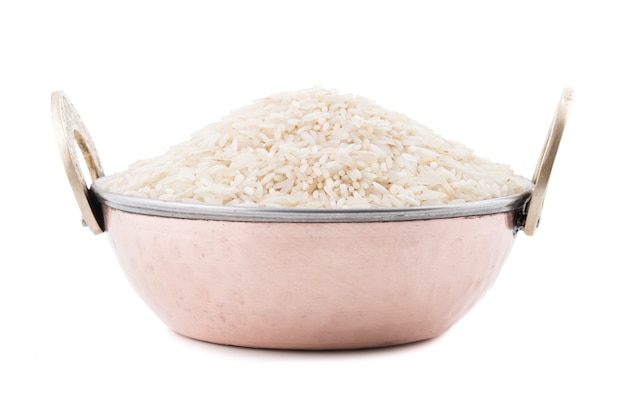 Premium Photo | Fresh raw rice on white background