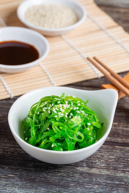 Fresh seaweed salad, healthy vegetarian food. Premium Photo