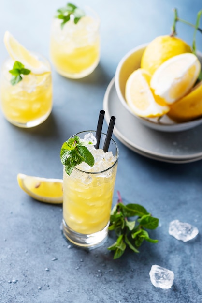 Premium Photo | Fresh summer cocktail with lemons