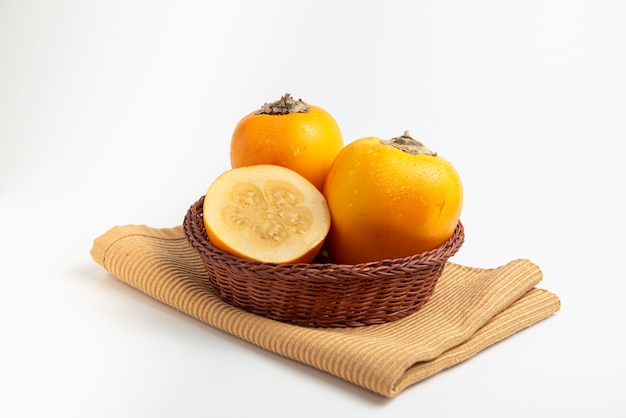 Fresh tropical fruit in a rustic bowl cocona Premium Photo