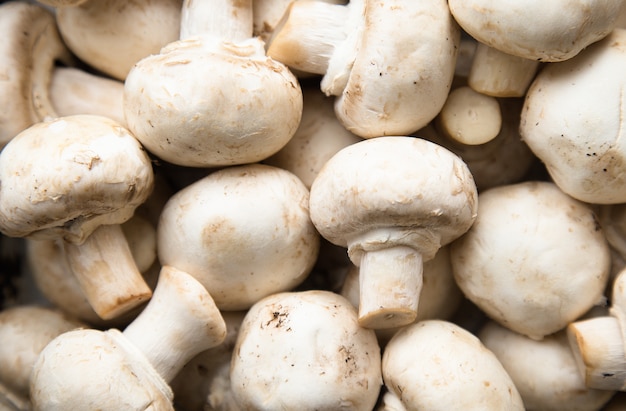 Premium Photo | Fresh whole mushrooms