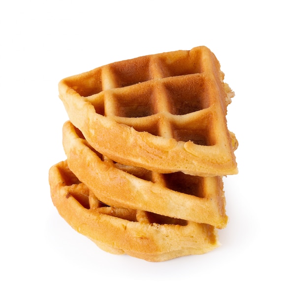 Premium Photo | Freshly Baked Waffles Isolated Over White Background.