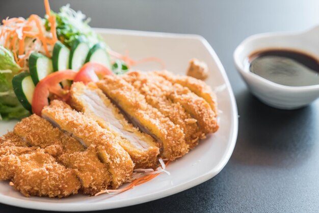 Premium Photo | Fried cutlet pork with vegetable