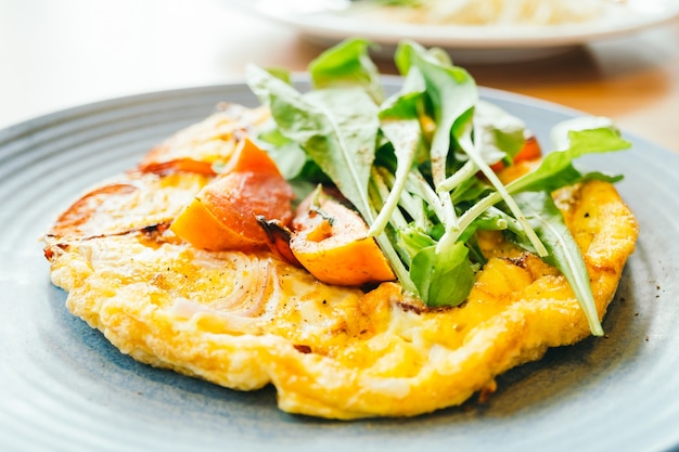 Free Photo | Fried eggs omelette in white plate