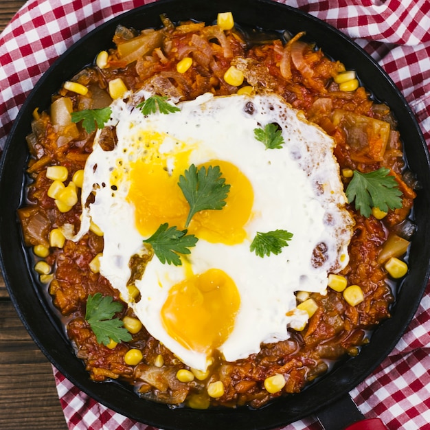 Free Photo | Fried eggs with mexican food in a pan