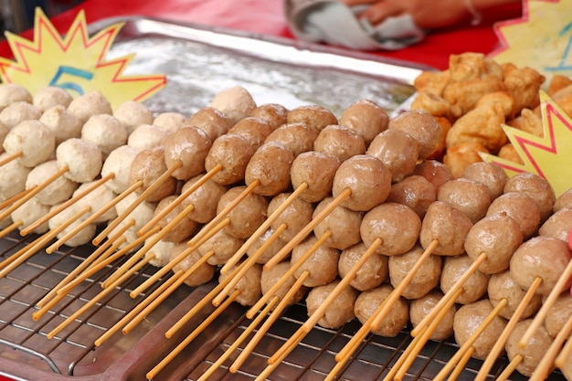 Premium Photo | Fried meatballs at street food