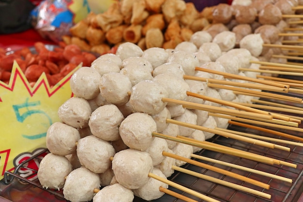 Premium Photo | Fried meatballs at street food