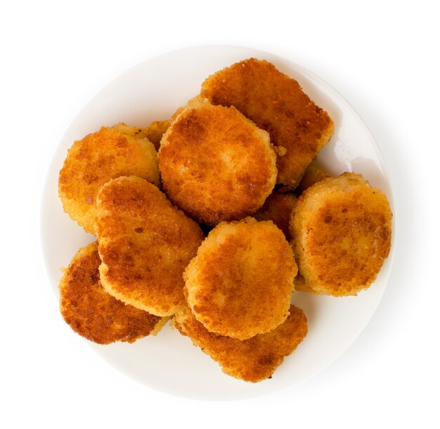 Premium Photo | Fried nuggets in a plate isolated