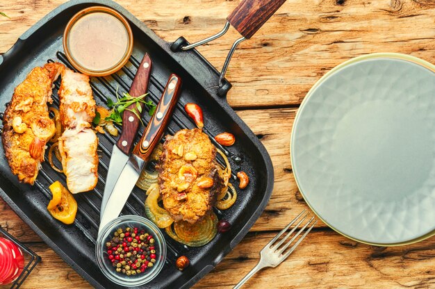 Premium Photo Fried Piece Fish In Grill Pan